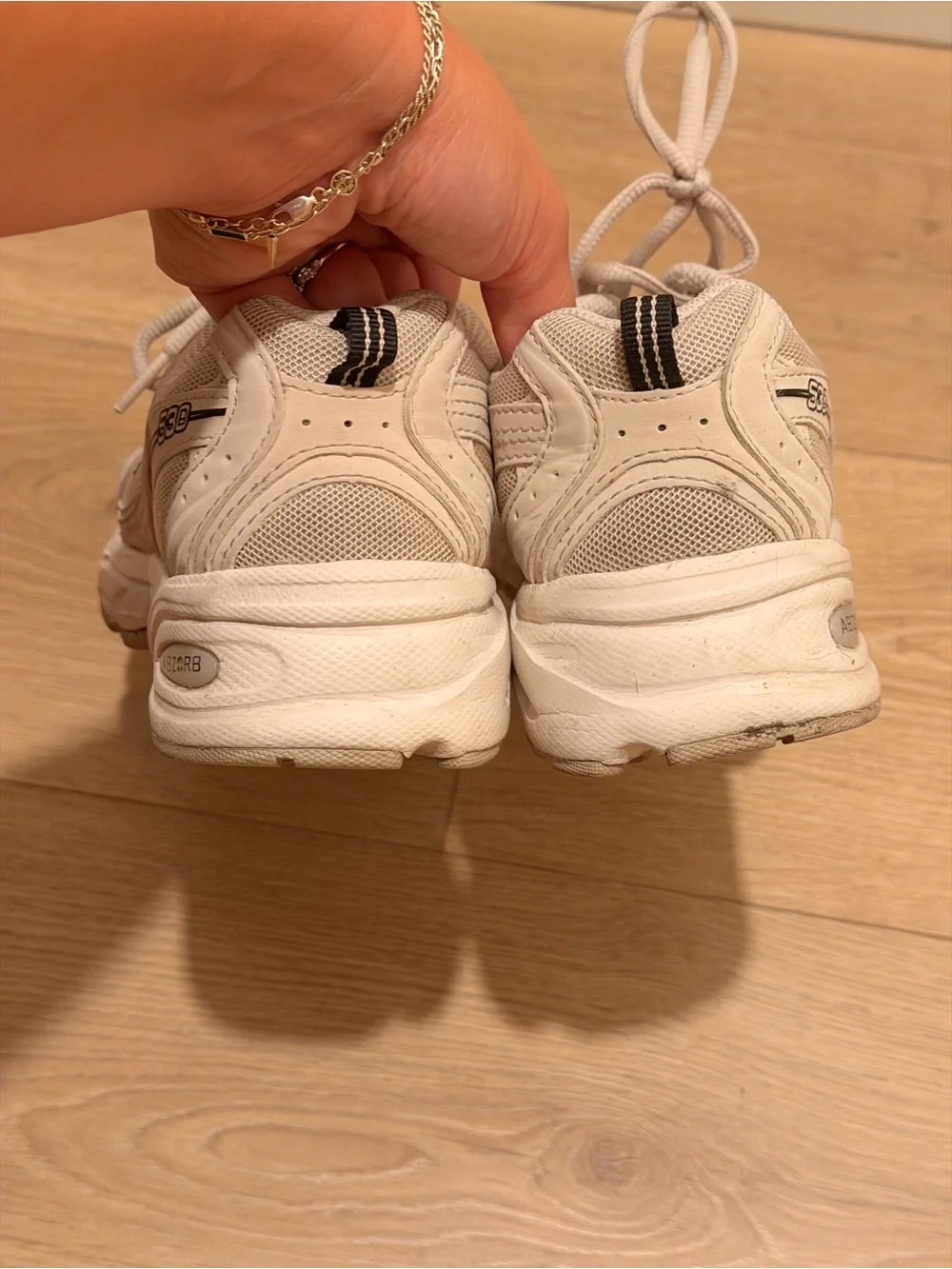New Balance Cream Sneakers with Black Logo